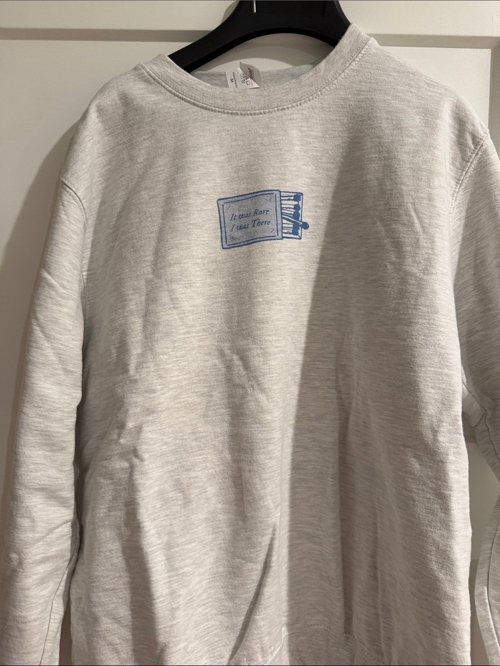 Light Gray Crewneck Sweatshirt with Small Blue Book Graphic Taylor Swift NWOT